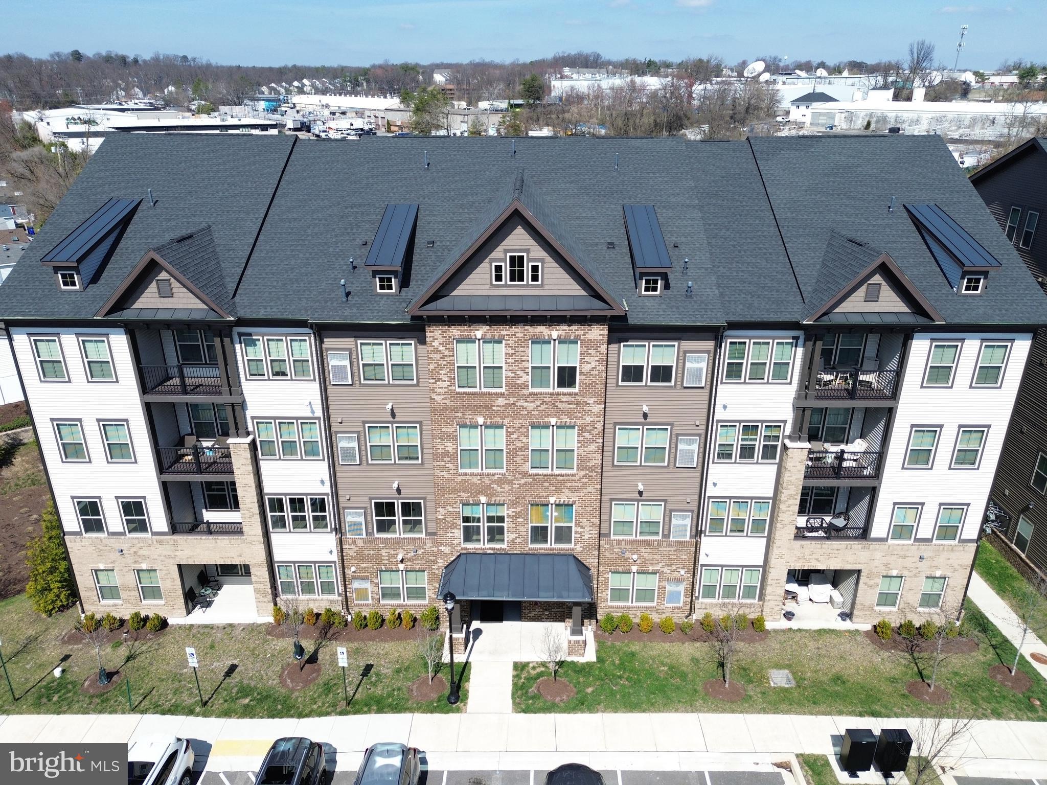 10020 Ruffian Way, Unit A Laurel, MD 20723 - Photo 36 of 36 a black and white photo of a living room