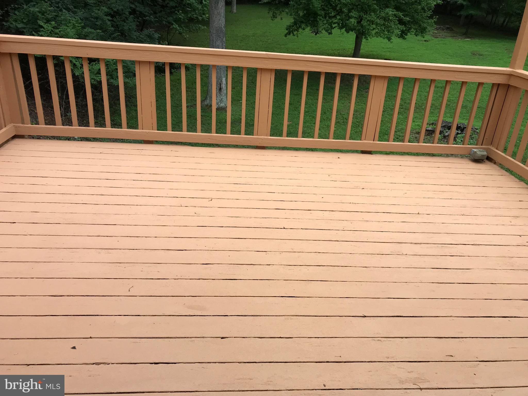 113 Kingsley Road Southwest Vienna, VA 22180 - Photo 14 of 40 Spacious deck for outdoor relaxation.