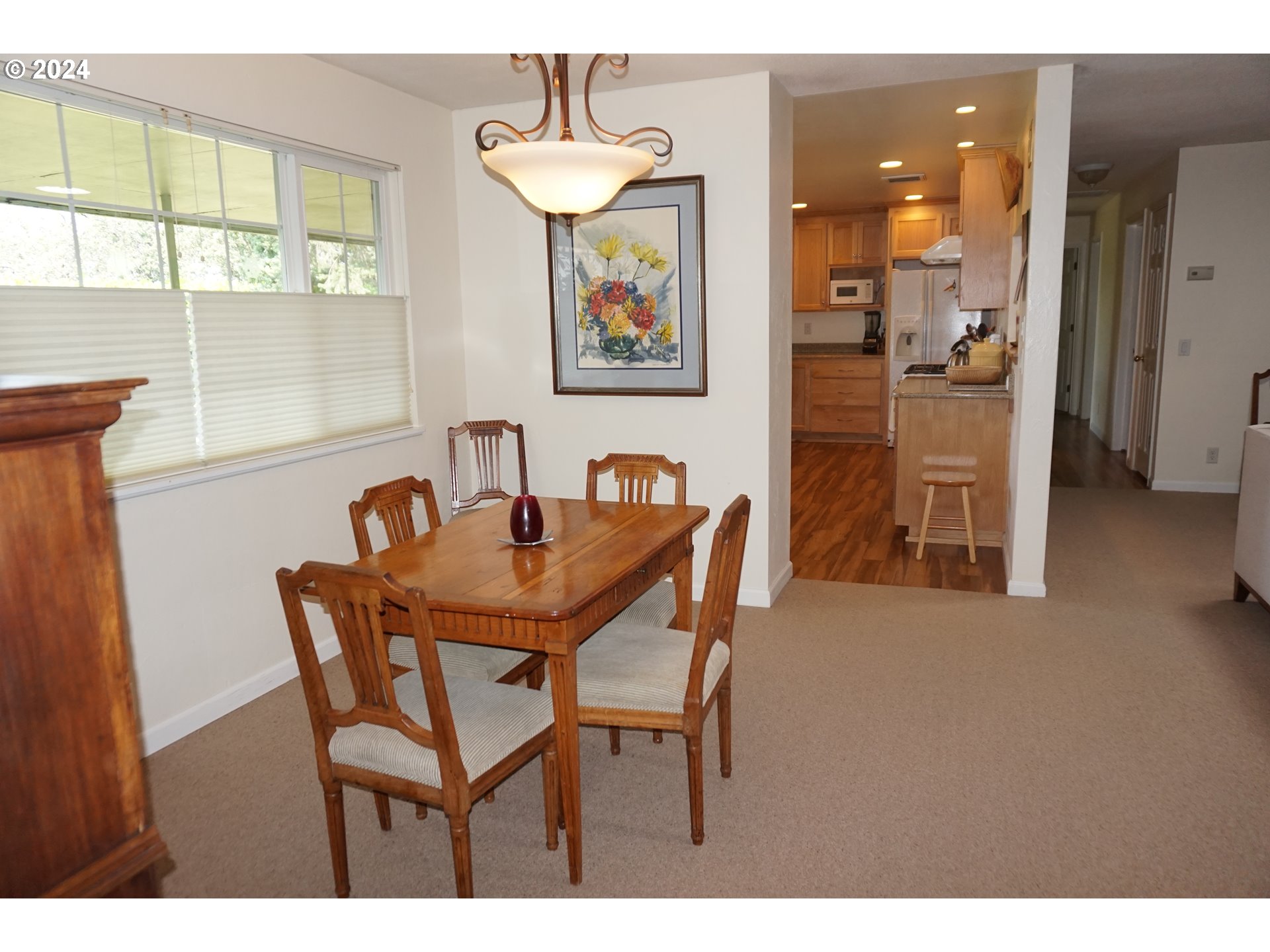 3055 Charnelton Street Eugene, OR 97405 - Photo 11 of 45 a view of a dining room with furniture and window