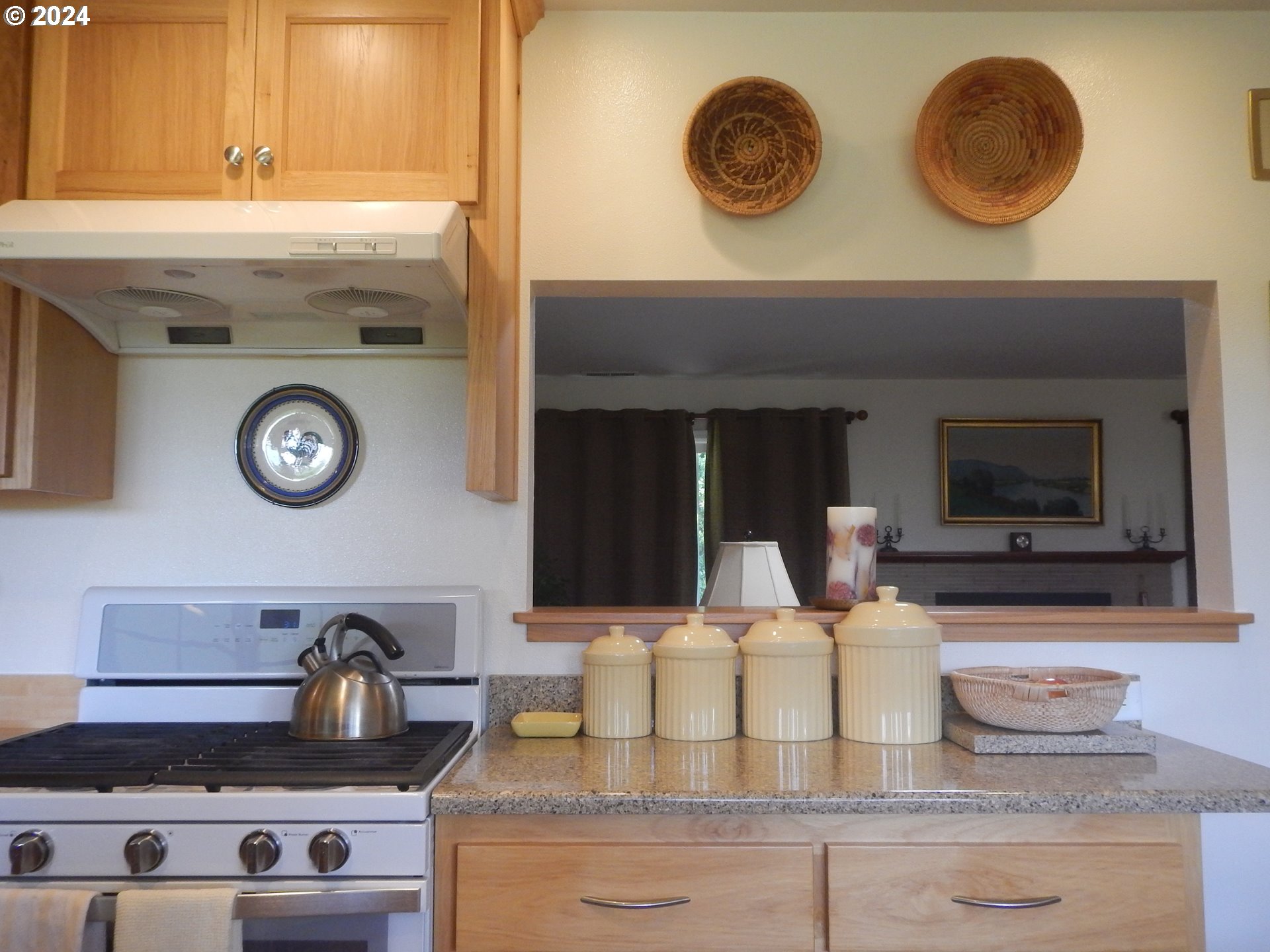 3055 Charnelton Street Eugene, OR 97405 - Photo 15 of 45 a kitchen with a stove and a microwave