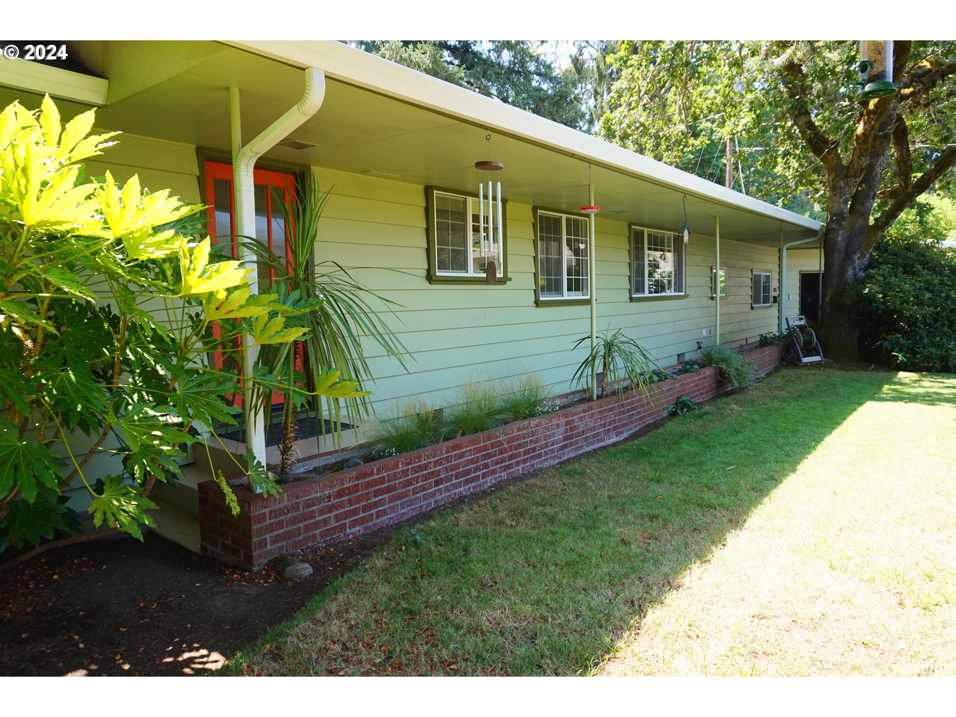3055 Charnelton Street Eugene, OR 97405 - Photo 2 of 45 a view of a house with a backyard