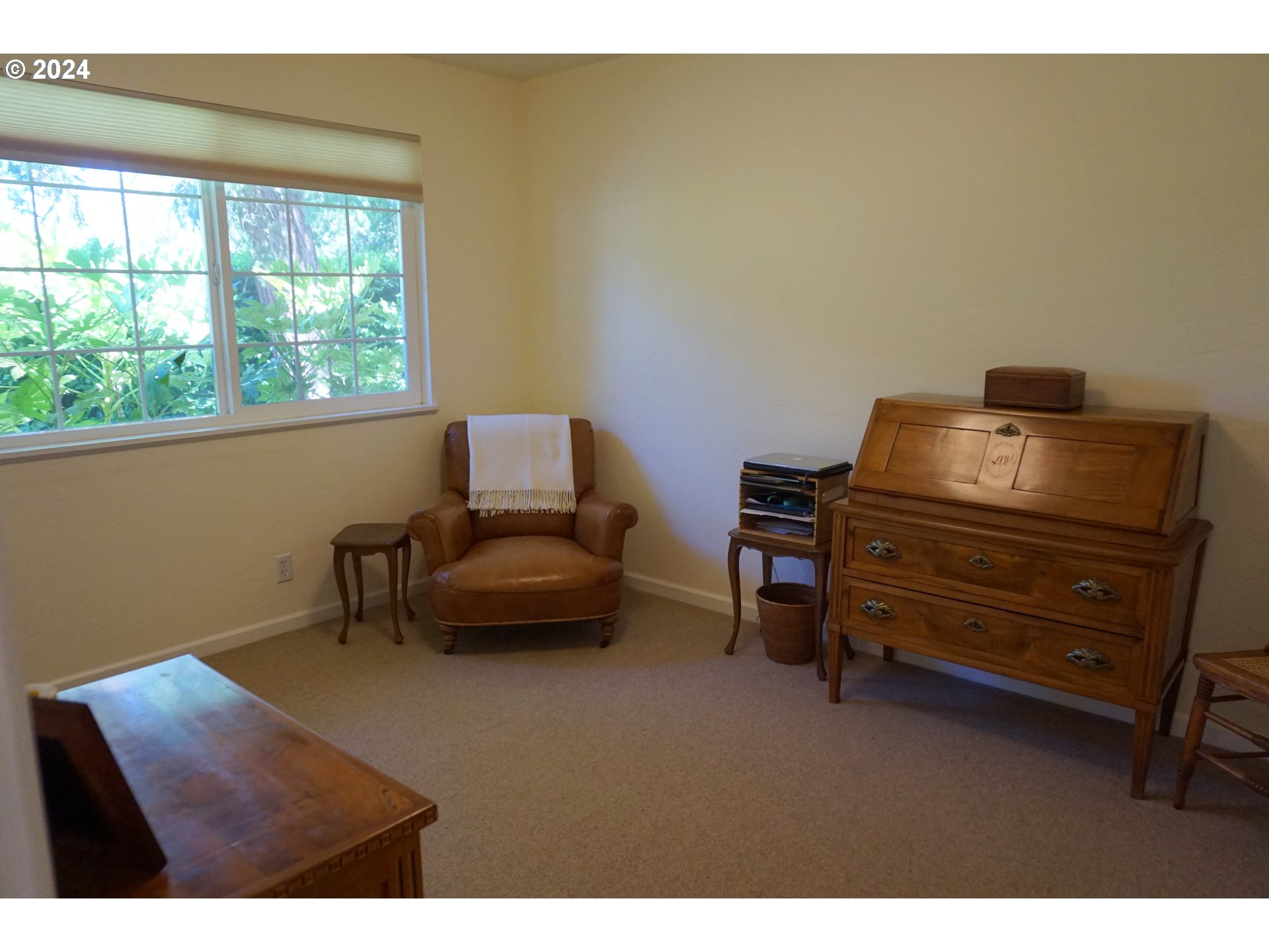 3055 Charnelton Street Eugene, OR 97405 - Photo 22 of 45 a living room with furniture and a window