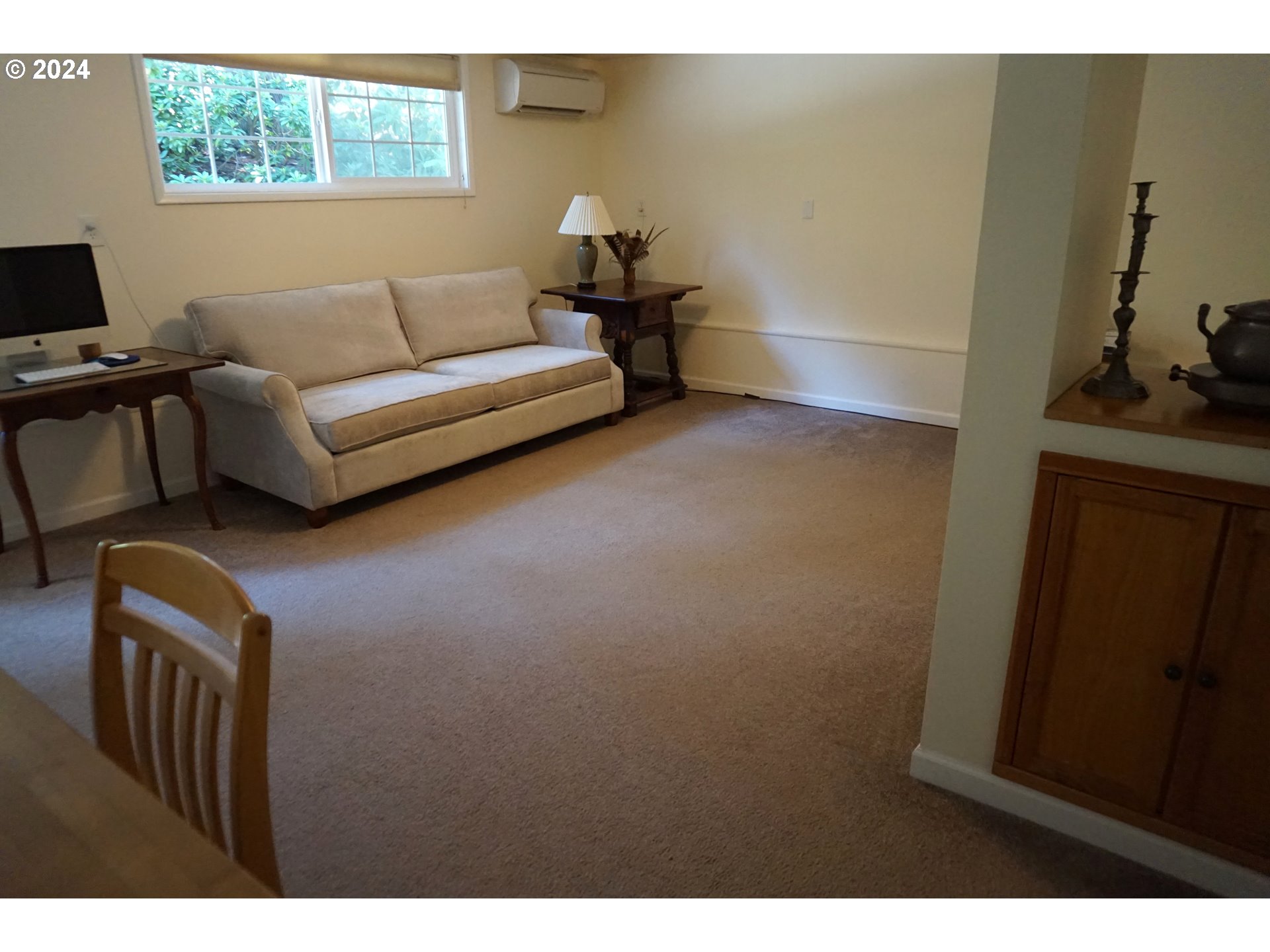3055 Charnelton Street Eugene, OR 97405 - Photo 28 of 45 a living room with furniture and a window