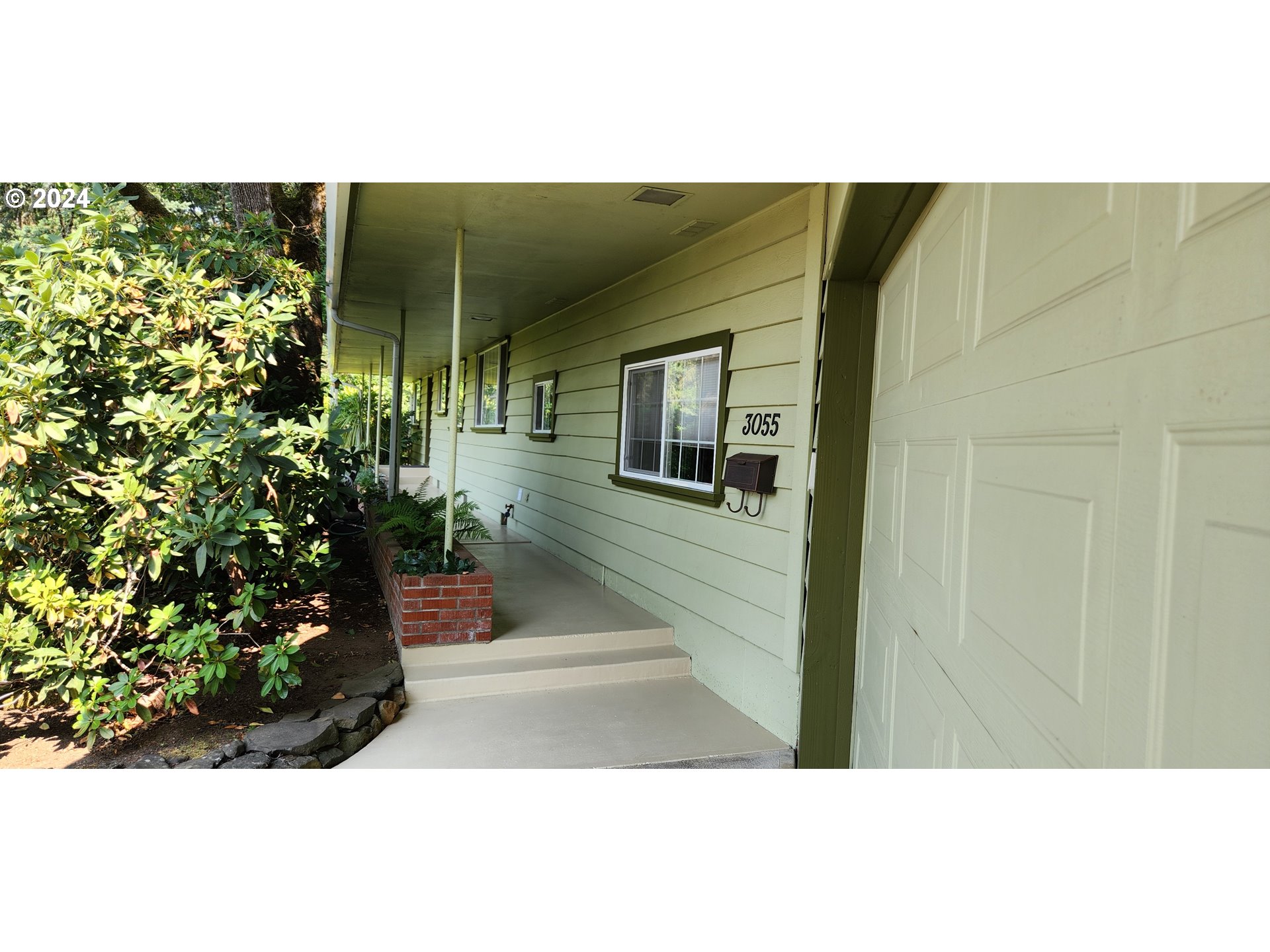 3055 Charnelton Street Eugene, OR 97405 - Photo 3 of 45 a view of a porch
