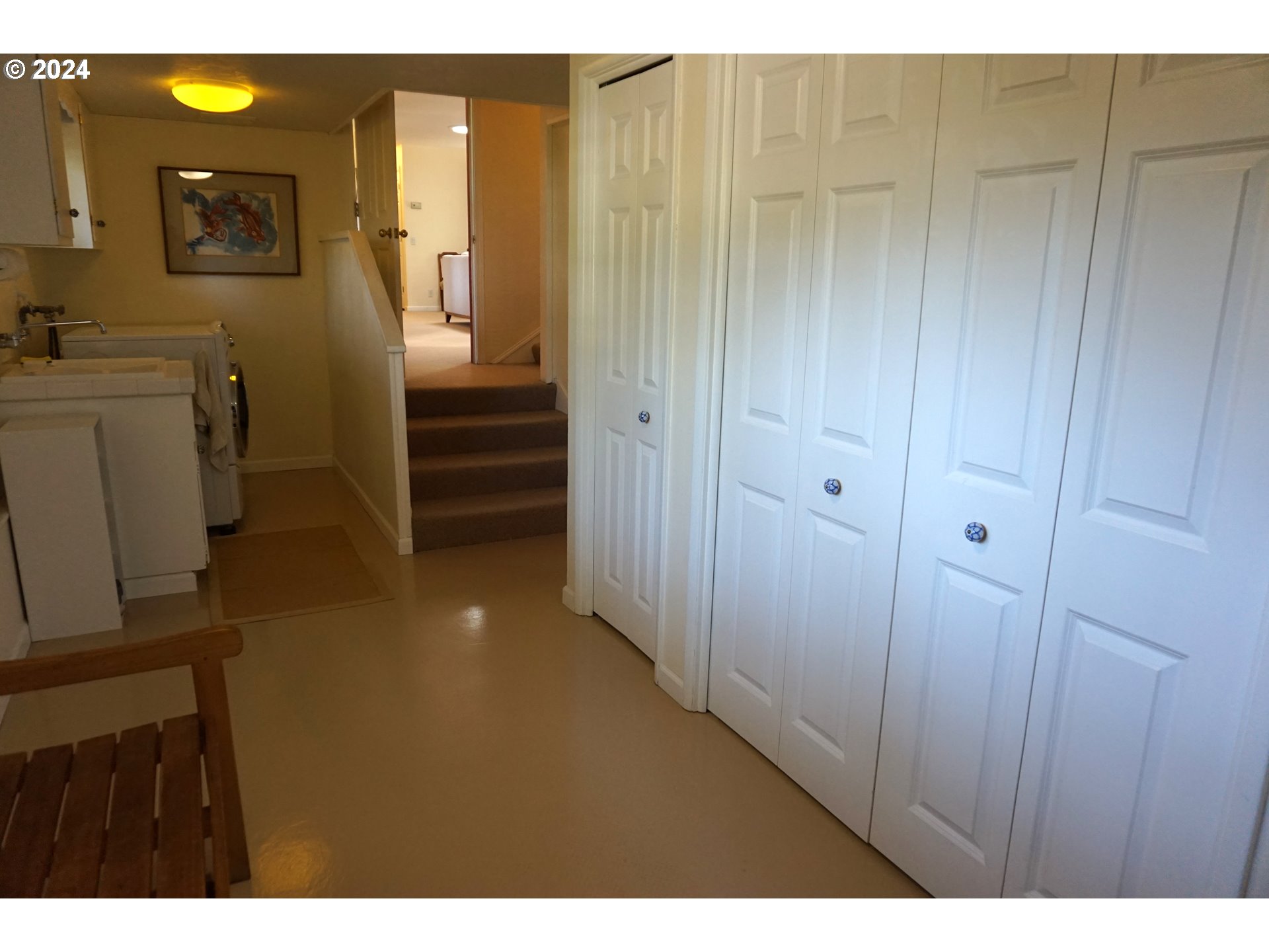 3055 Charnelton Street Eugene, OR 97405 - Photo 34 of 45 a view of a hallway with wooden shelves