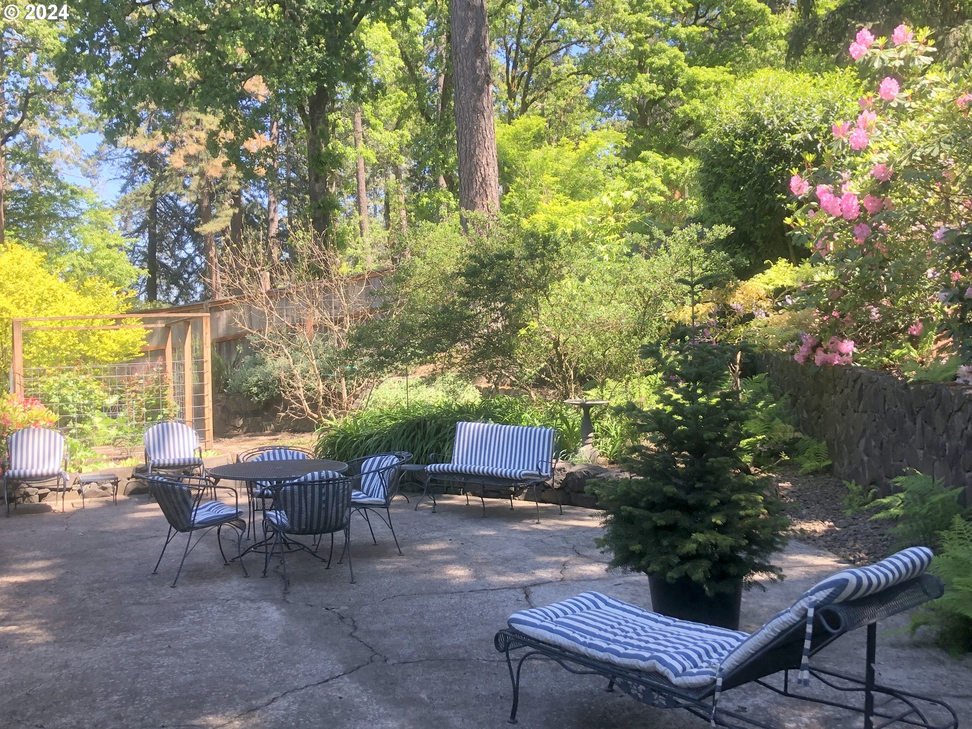 3055 Charnelton Street Eugene, OR 97405 - Photo 39 of 45 a backyard of a house with outdoor seating