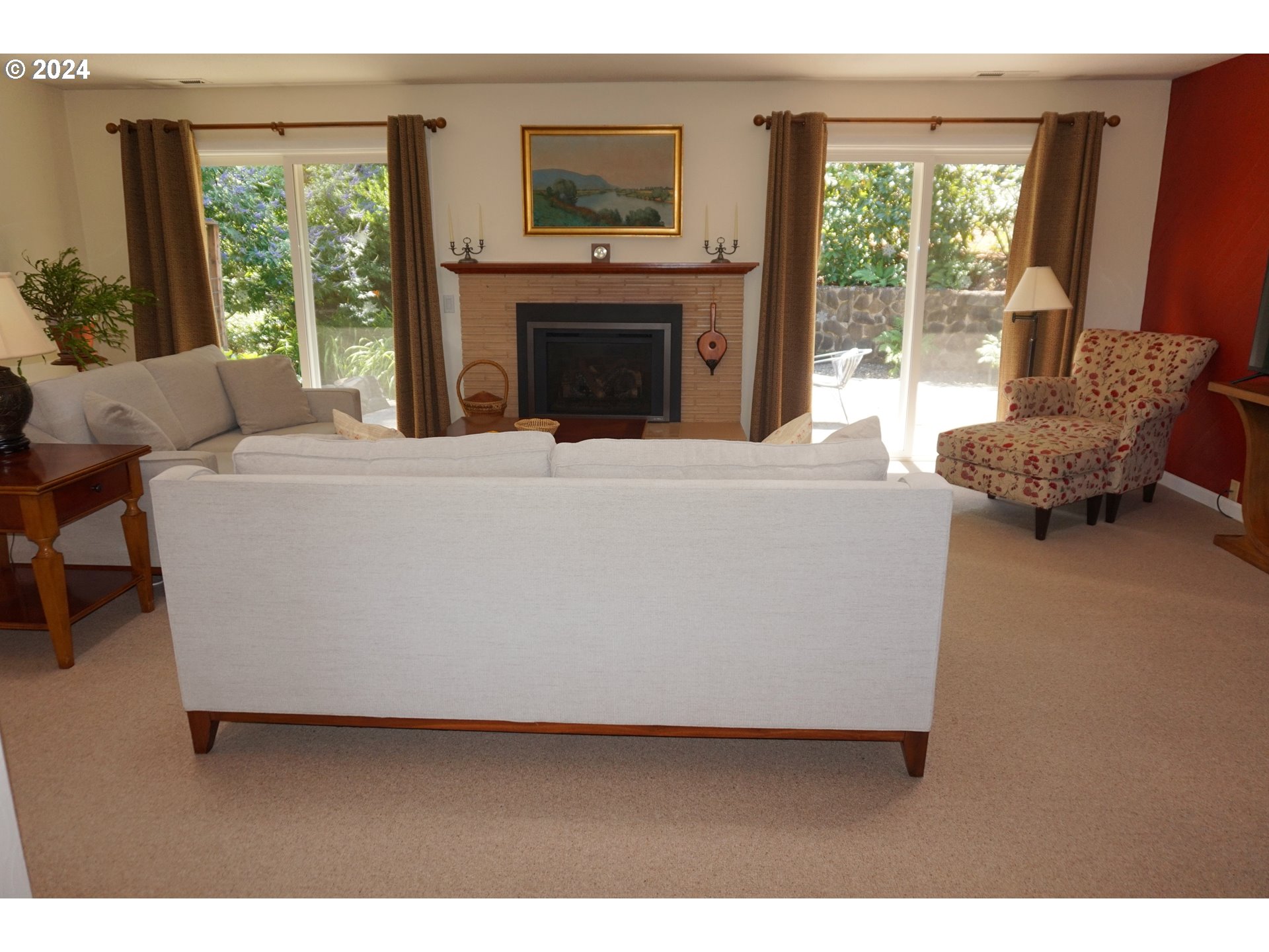 3055 Charnelton Street Eugene, OR 97405 - Photo 8 of 45 a living room with furniture and a fireplace