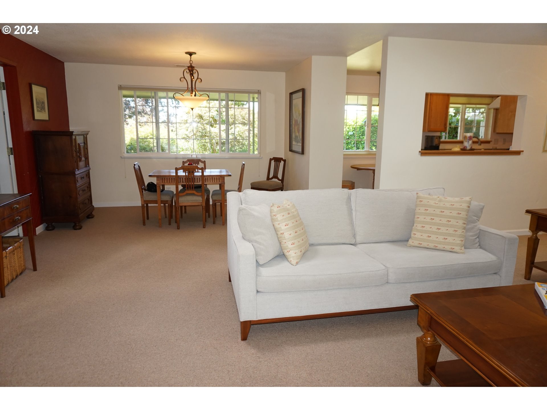 3055 Charnelton Street Eugene, OR 97405 - Photo 10 of 45 a living room with furniture and a large window