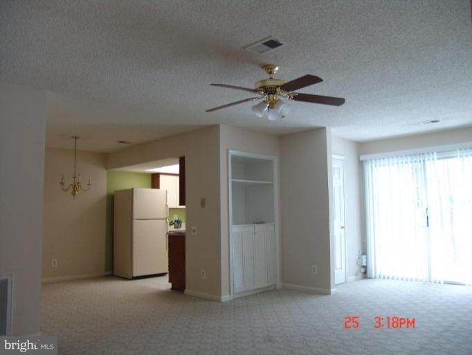 12016 Golf Ridge Court, Unit 101 Fairfax, VA 22033 - Photo 4 of 9 Living Room #2