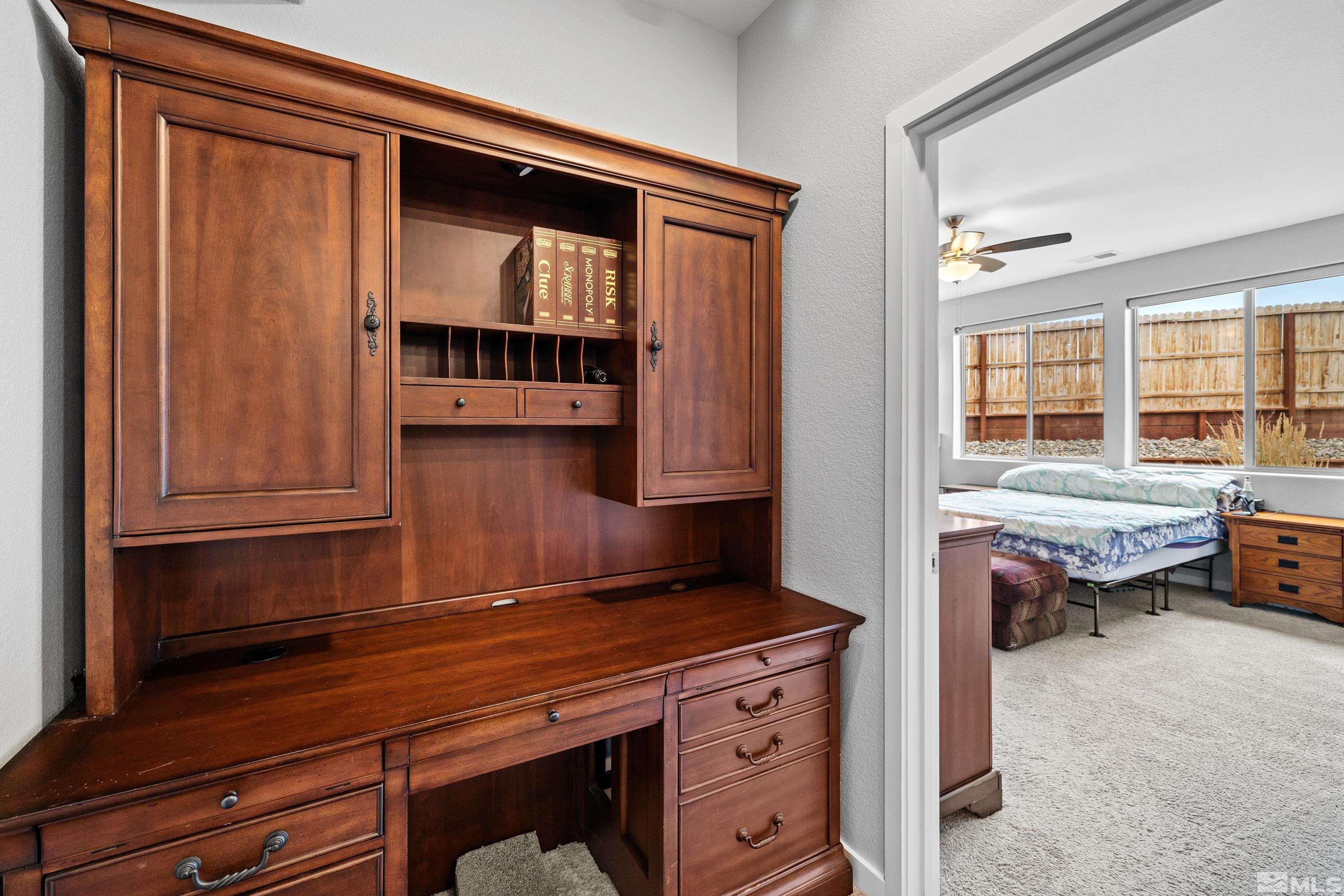 7217 Mustengo Drive Reno, NV 89506 - Photo 15 of 36 a kitchen with a stove and a cabinet