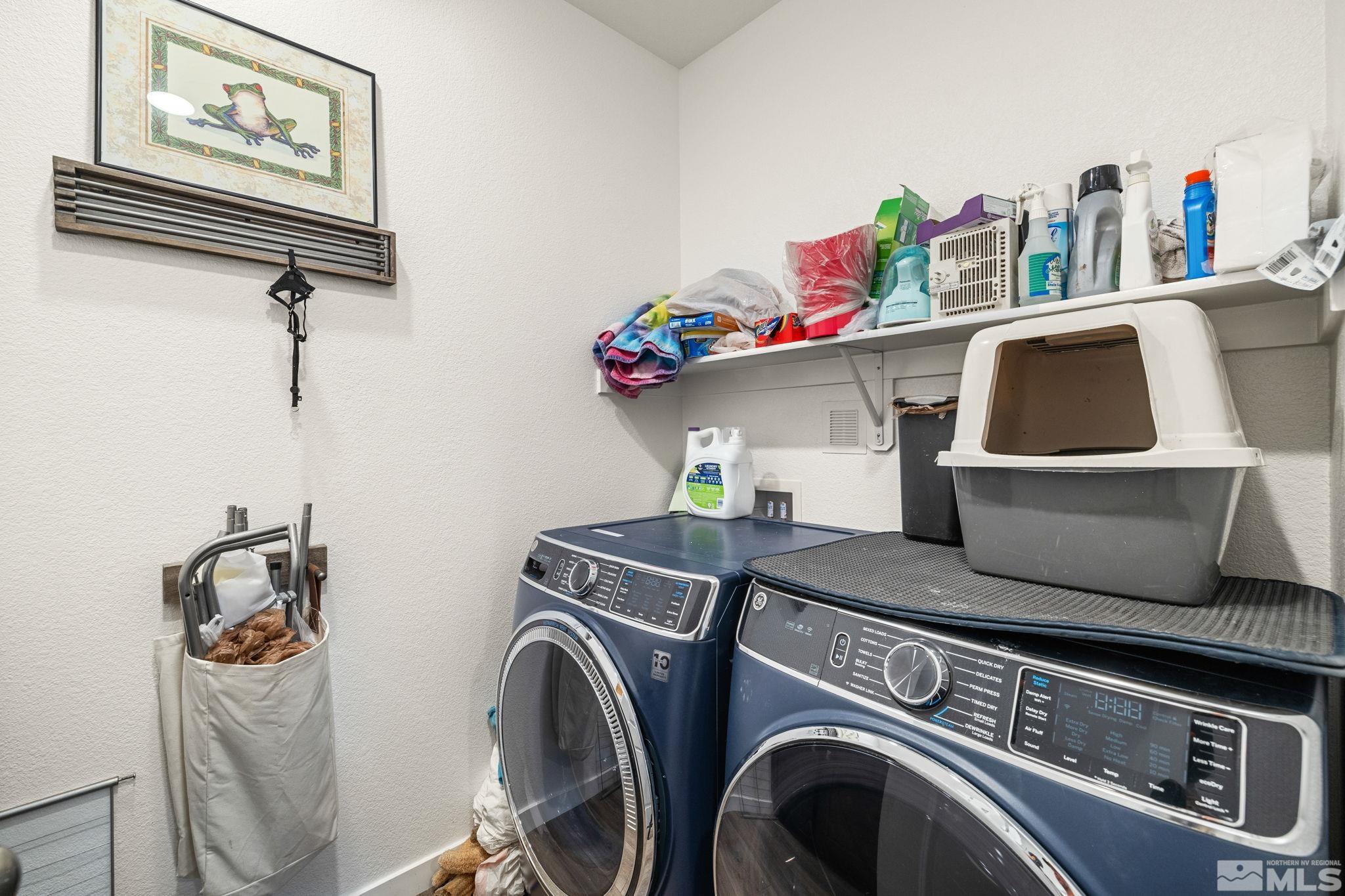 7217 Mustengo Drive Reno, NV 89506 - Photo 18 of 36 a utility room with dryer and washer