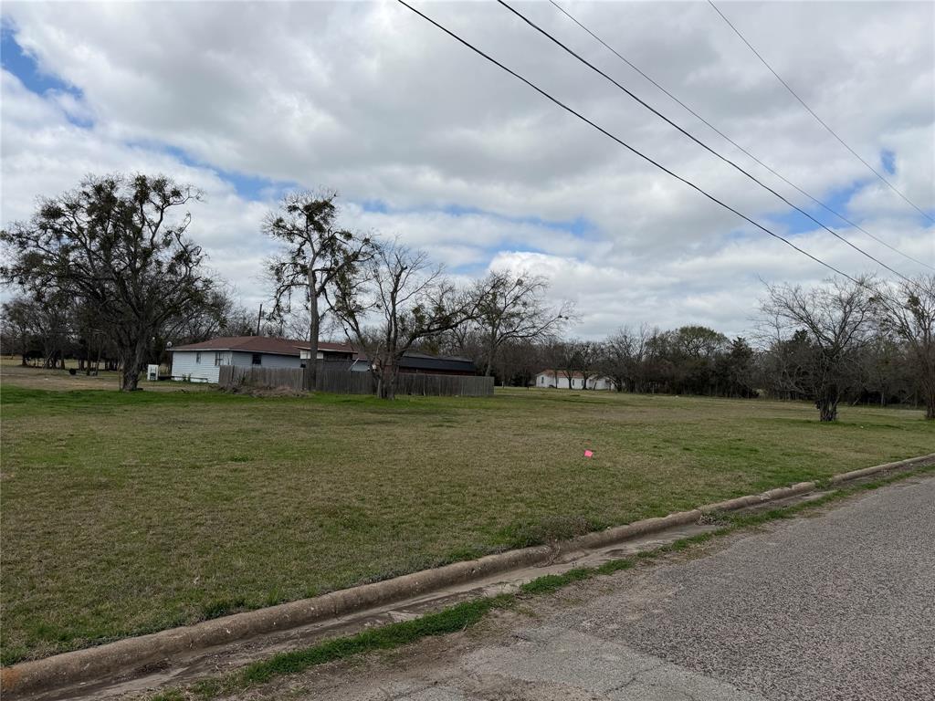 102 Johnson Street Commerce, TX 75428 - Photo 4 of 7 a view of a field