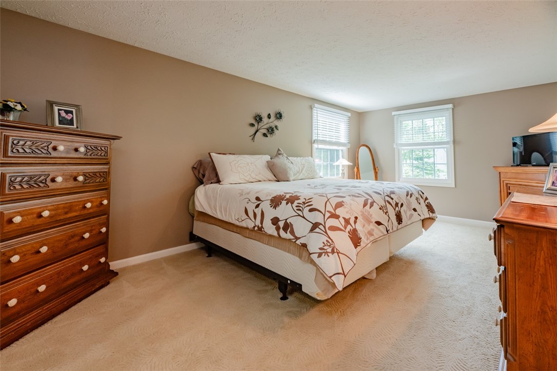 77 Misty Pine Road Perinton, NY 14450 - Photo 25 of 47 THE PRIMARY SUITE CONSISTS OF THIS LARGE BEDROOM,