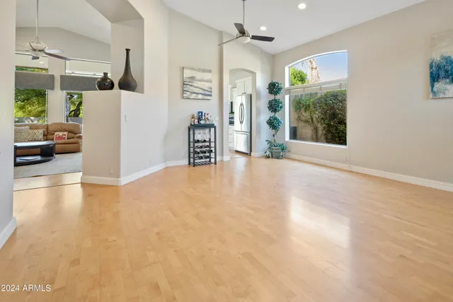 a view of livingroom with furniture and a window