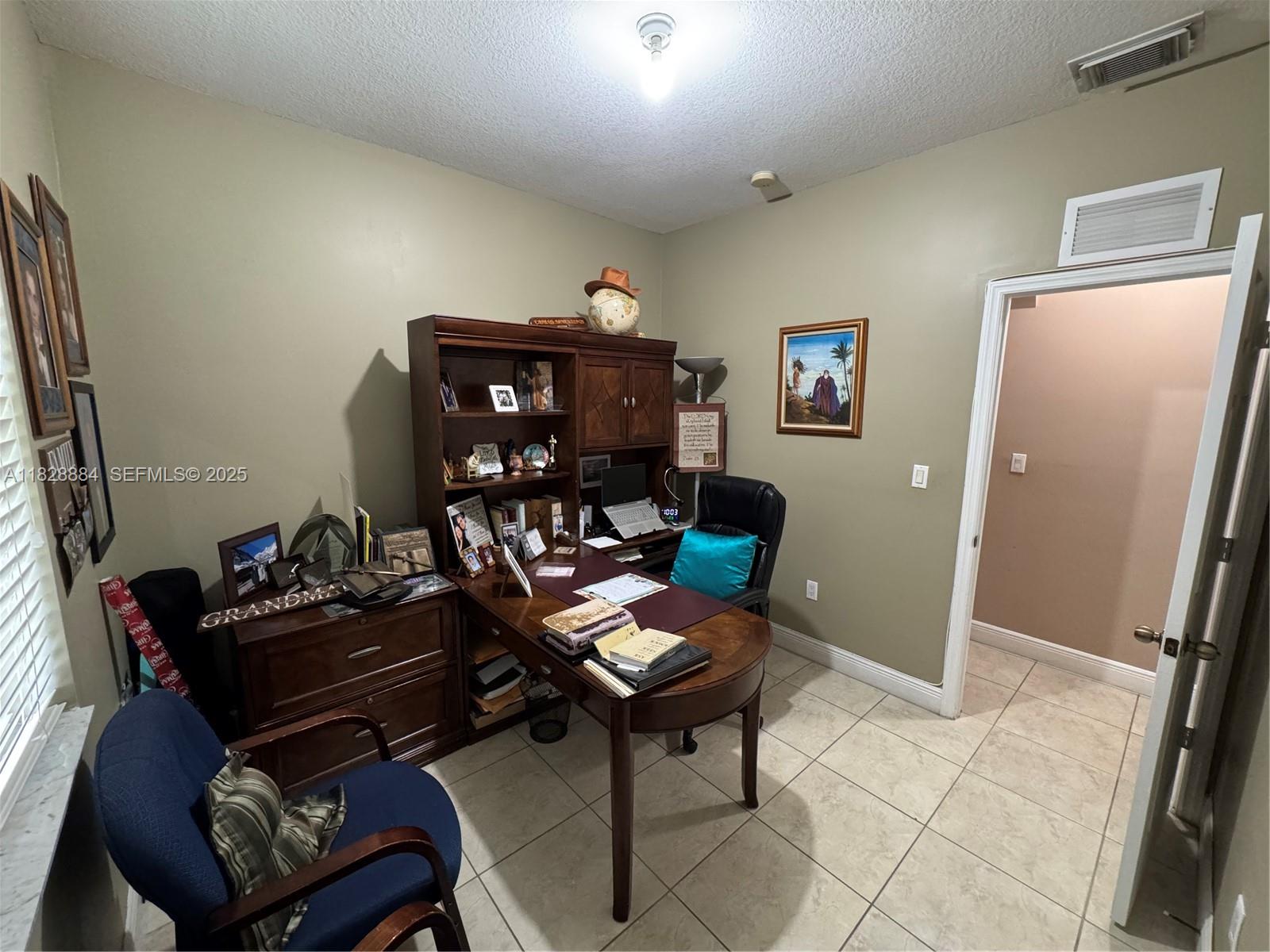 20233 Southwest 128th Place Miami, FL 33177 - Photo 19 of 21 a living room with furniture