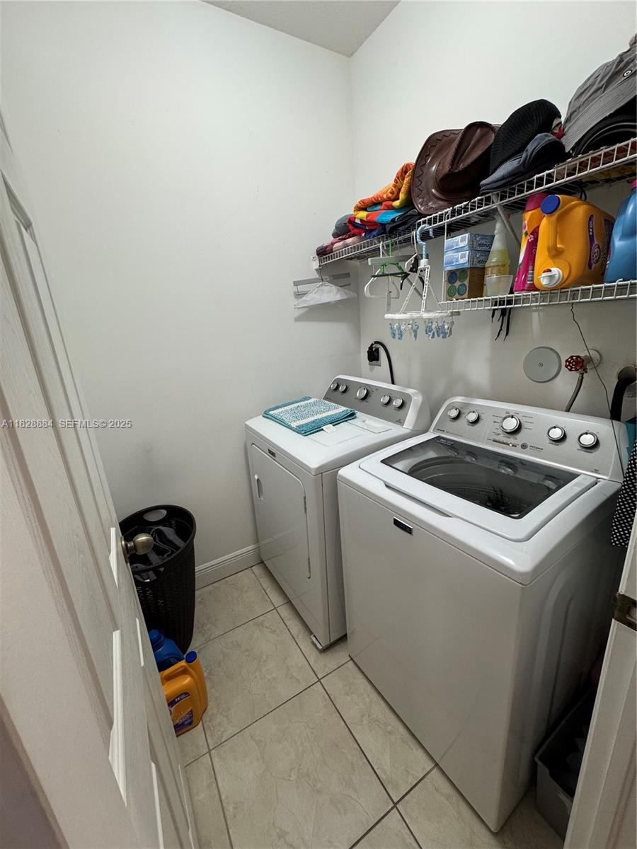 20233 Southwest 128th Place Miami, FL 33177 - Photo 21 of 21 a utility room with dryer and washer