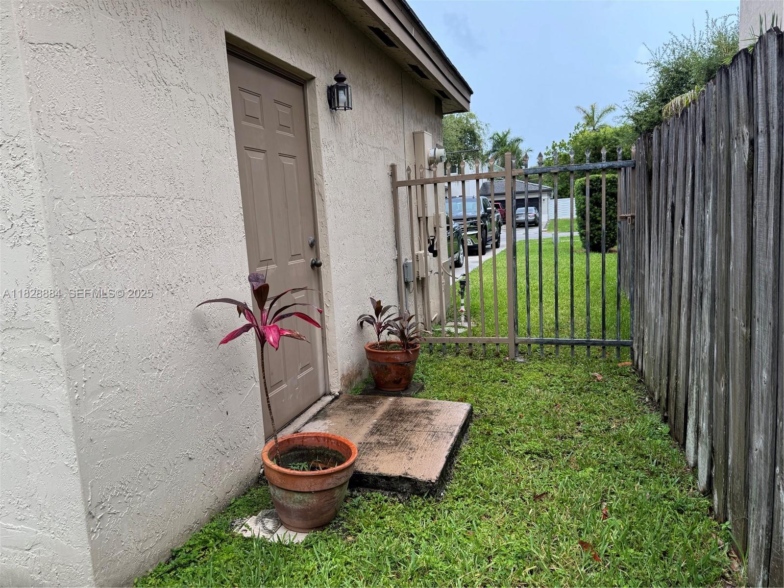 20233 Southwest 128th Place Miami, FL 33177 - Photo 6 of 21 a garden view with a seating space