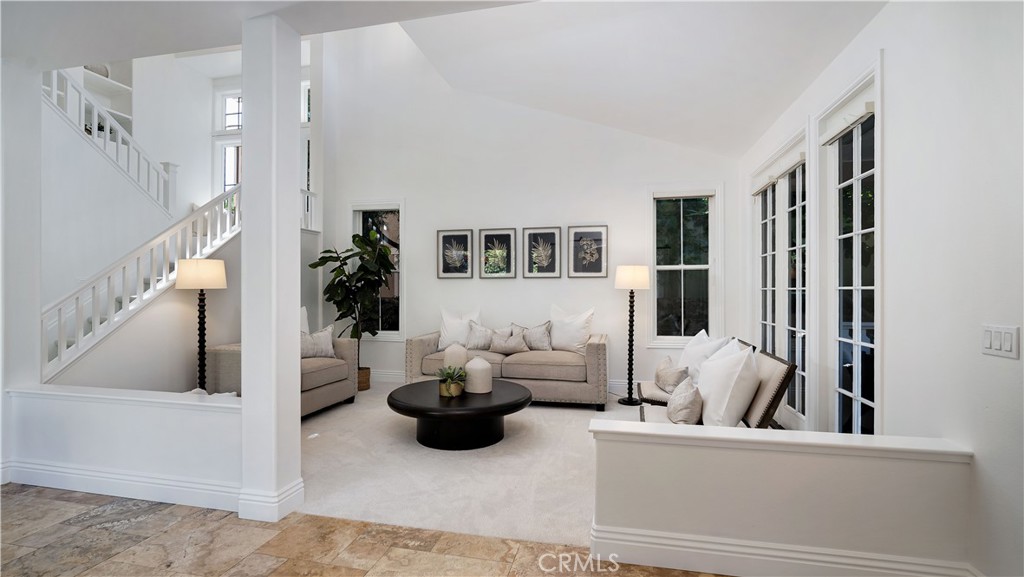 16 Bayleaf Lane Irvine, CA 92620 - Photo 11 of 66 a living room with furniture and a potted plant
