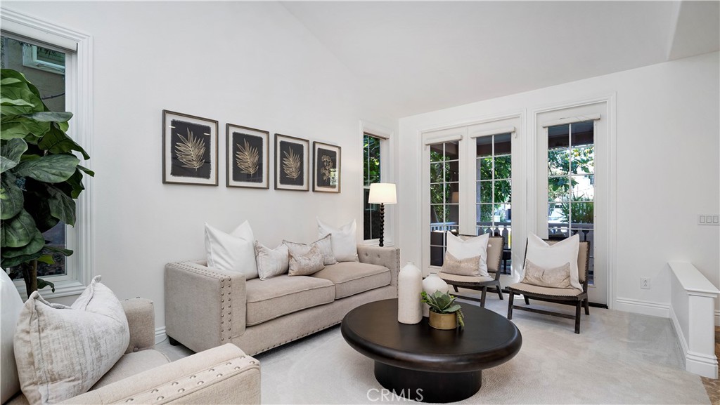 16 Bayleaf Lane Irvine, CA 92620 - Photo 12 of 66 a living room with furniture and a potted plant