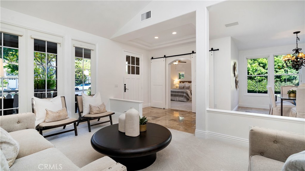 16 Bayleaf Lane Irvine, CA 92620 - Photo 2 of 66 a living room with furniture and a large window