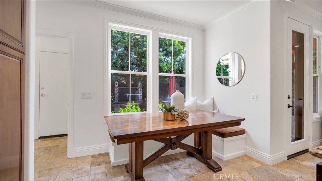 16 Bayleaf Lane Irvine, CA 92620 - Photo 27 of 66 a dining room with furniture and window