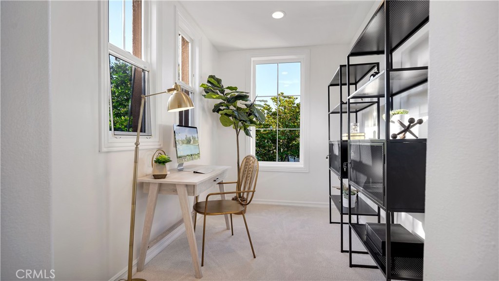 16 Bayleaf Lane Irvine, CA 92620 - Photo 32 of 66 a workspace room with furniture and a potted plant