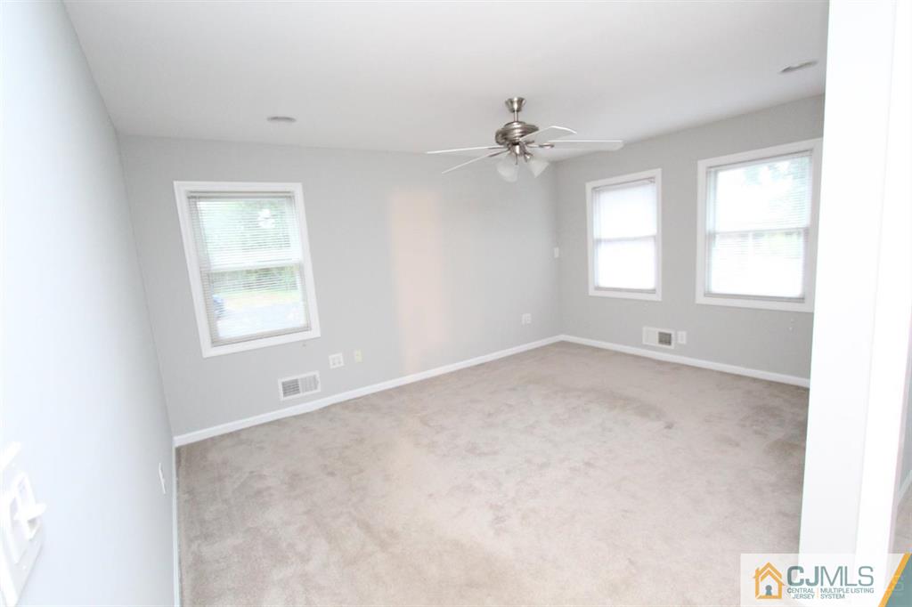 104 Grovers Mill Road Plainsboro, NJ 08536 - Photo 13 of 21 an empty room with a window