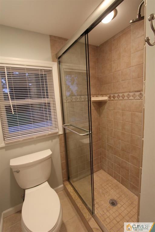 104 Grovers Mill Road Plainsboro, NJ 08536 - Photo 18 of 21 a bathroom with a toilet and a shower