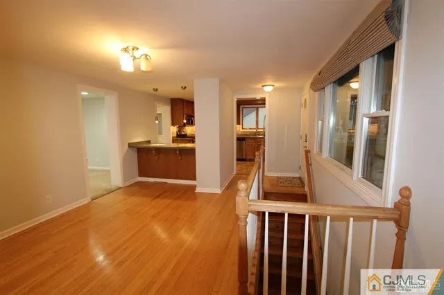 a view of livingroom with furniture and staircase