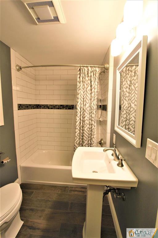 104 Grovers Mill Road Plainsboro, NJ 08536 - Photo 10 of 21 a bathroom with a sink a toilet and shower