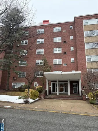 a front view of a multi story building