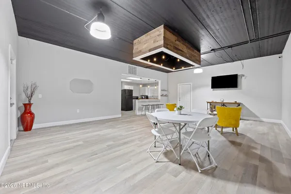 a wooden bench sitting in a room
