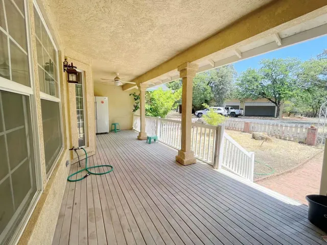 a view of outdoor space with wooden floor and outdoor space
