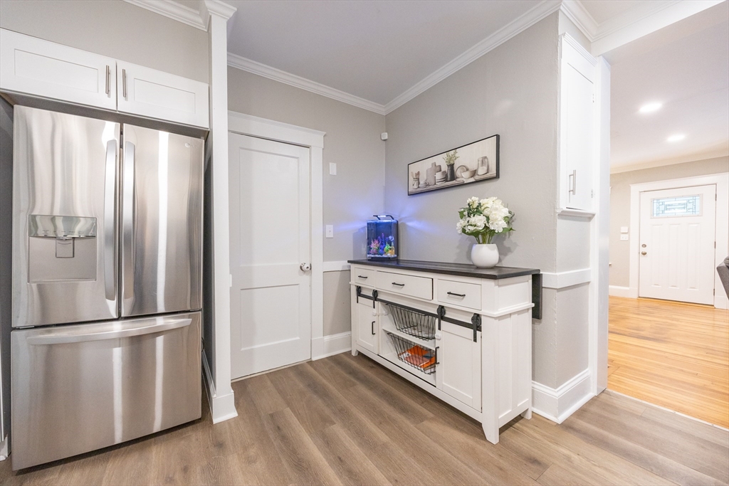 557 Dedham Street Wrentham, MA 02093 - Photo 17 of 42 a kitchen with stainless steel appliances a stove and a refrigerator