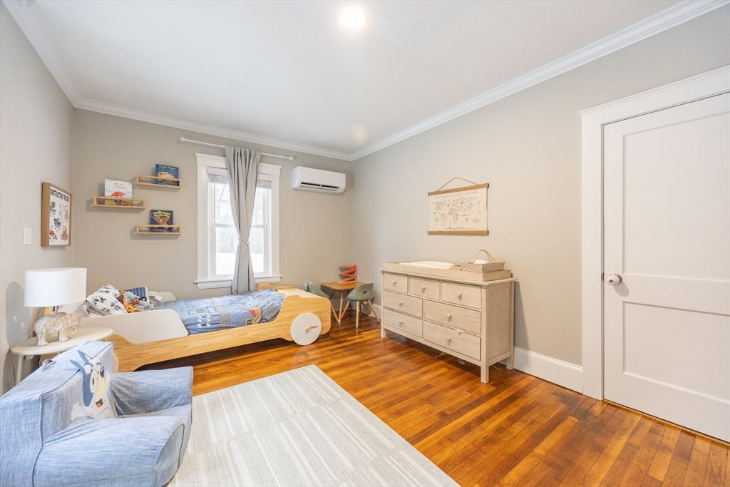 557 Dedham Street Wrentham, MA 02093 - Photo 28 of 42 a bed room with a bed and furniture