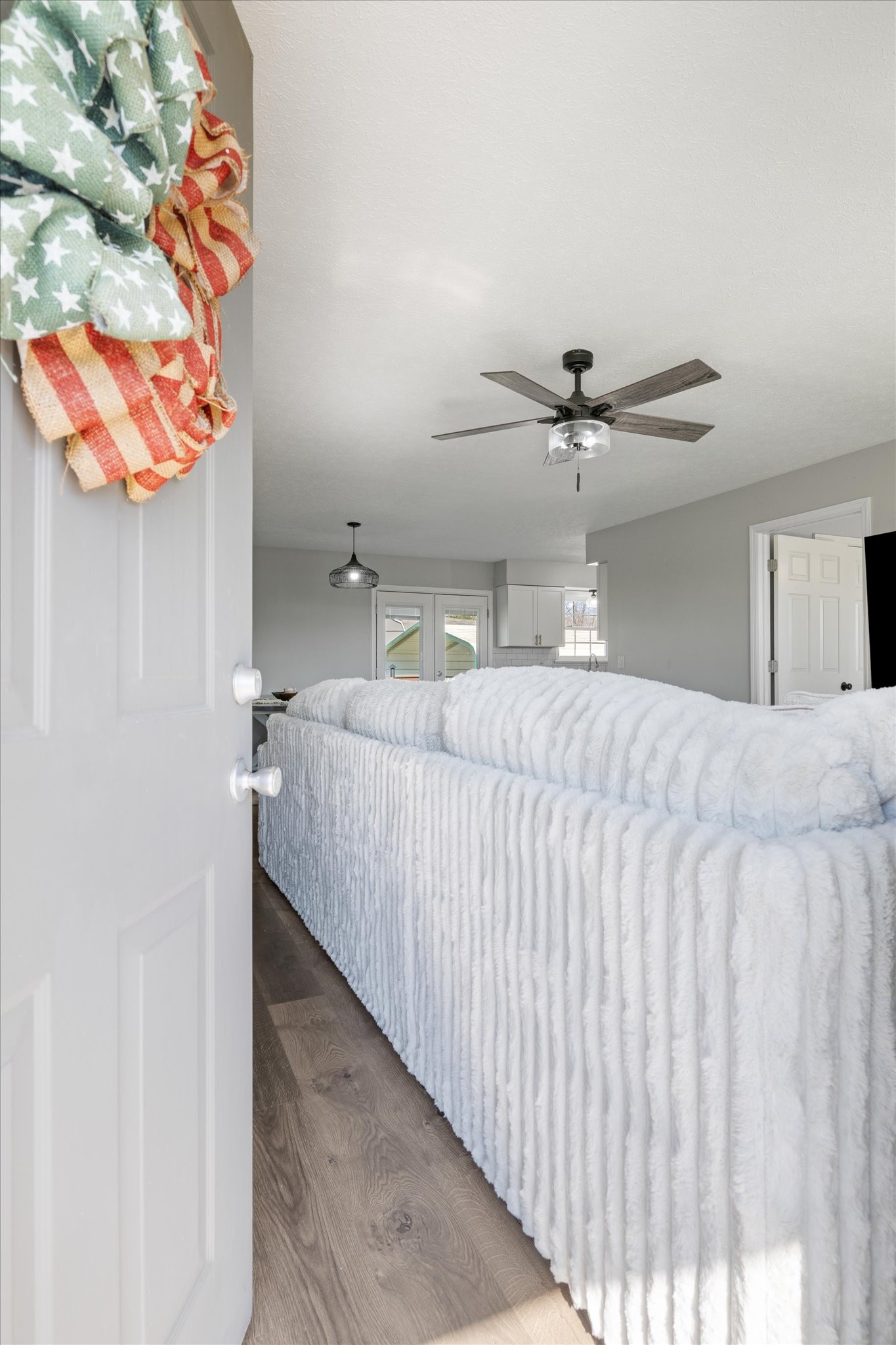3695 Armstrong Road Springfield, TN 37172 - Photo 20 of 36 a bedroom with a bed and a chandelier