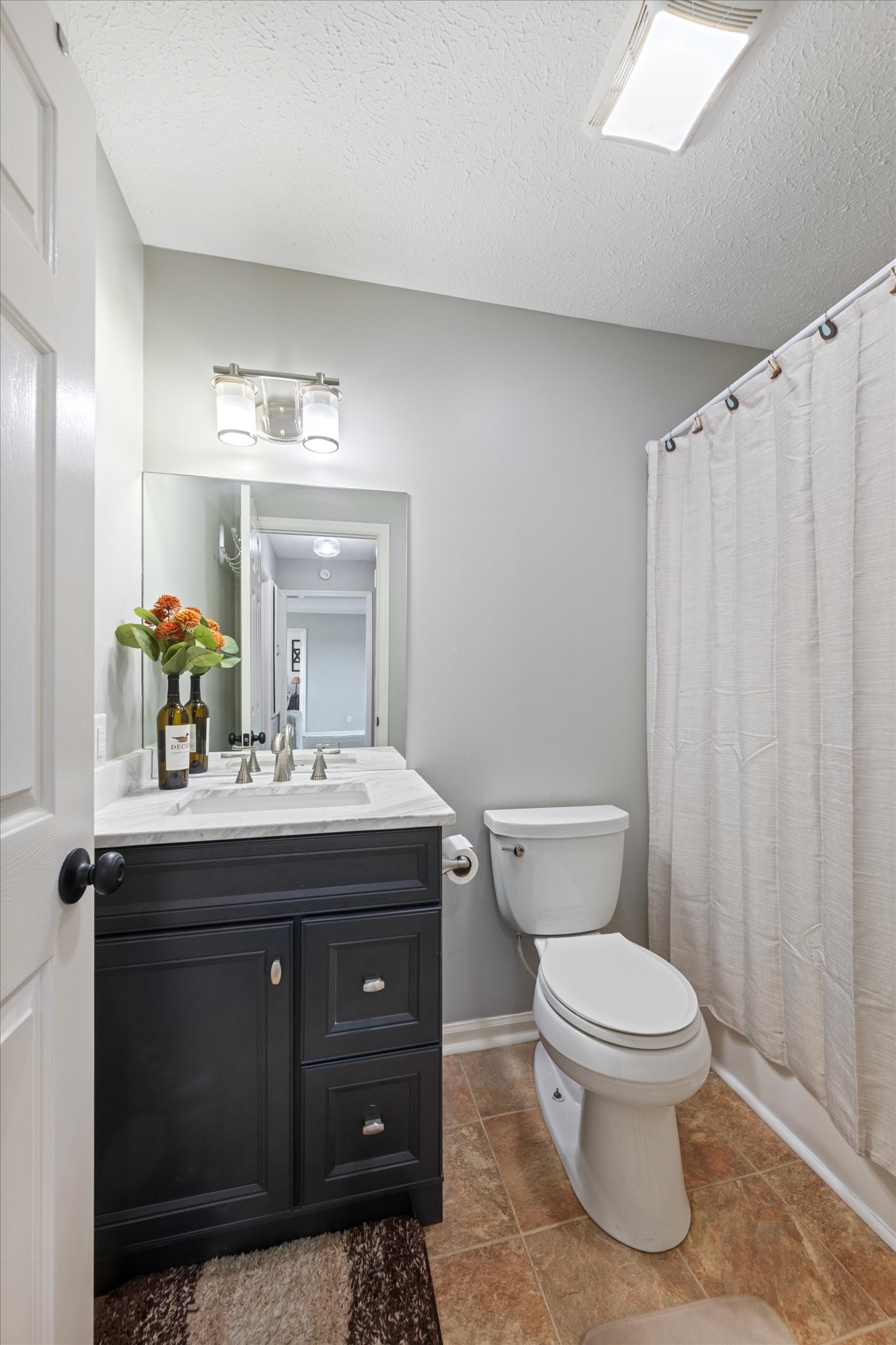 3695 Armstrong Road Springfield, TN 37172 - Photo 34 of 36 a bathroom with a toilet a sink and mirror