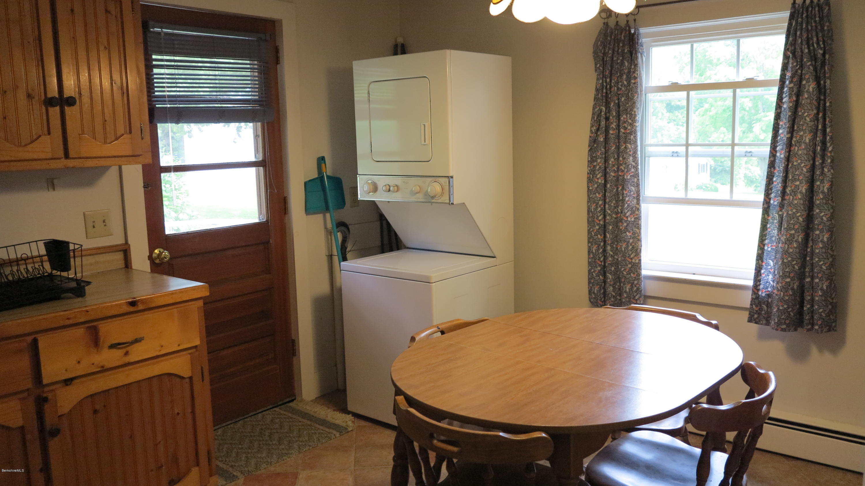 160 Cheever Road Richmond, MA 01254 - Photo 15 of 27 a view of a dining room with furniture window and wooden floor
