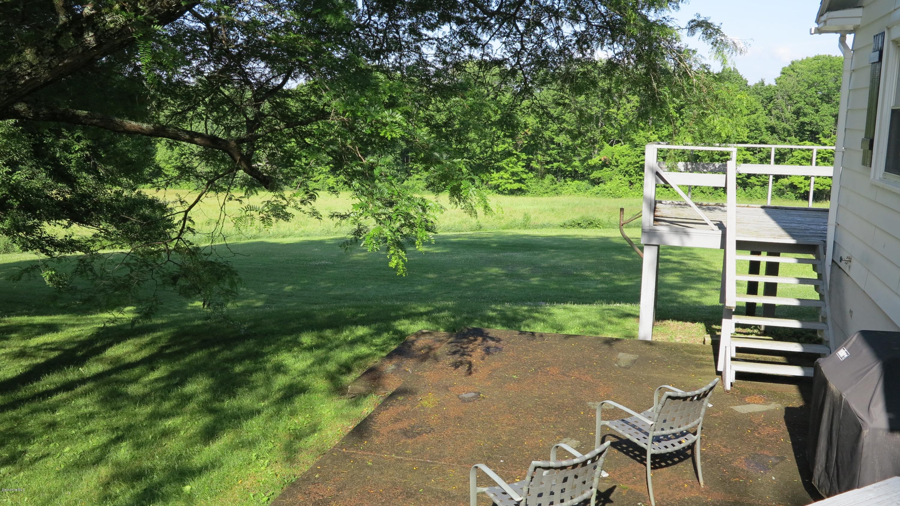 160 Cheever Road Richmond, MA 01254 - Photo 18 of 27 a view of a chair and table on the garden