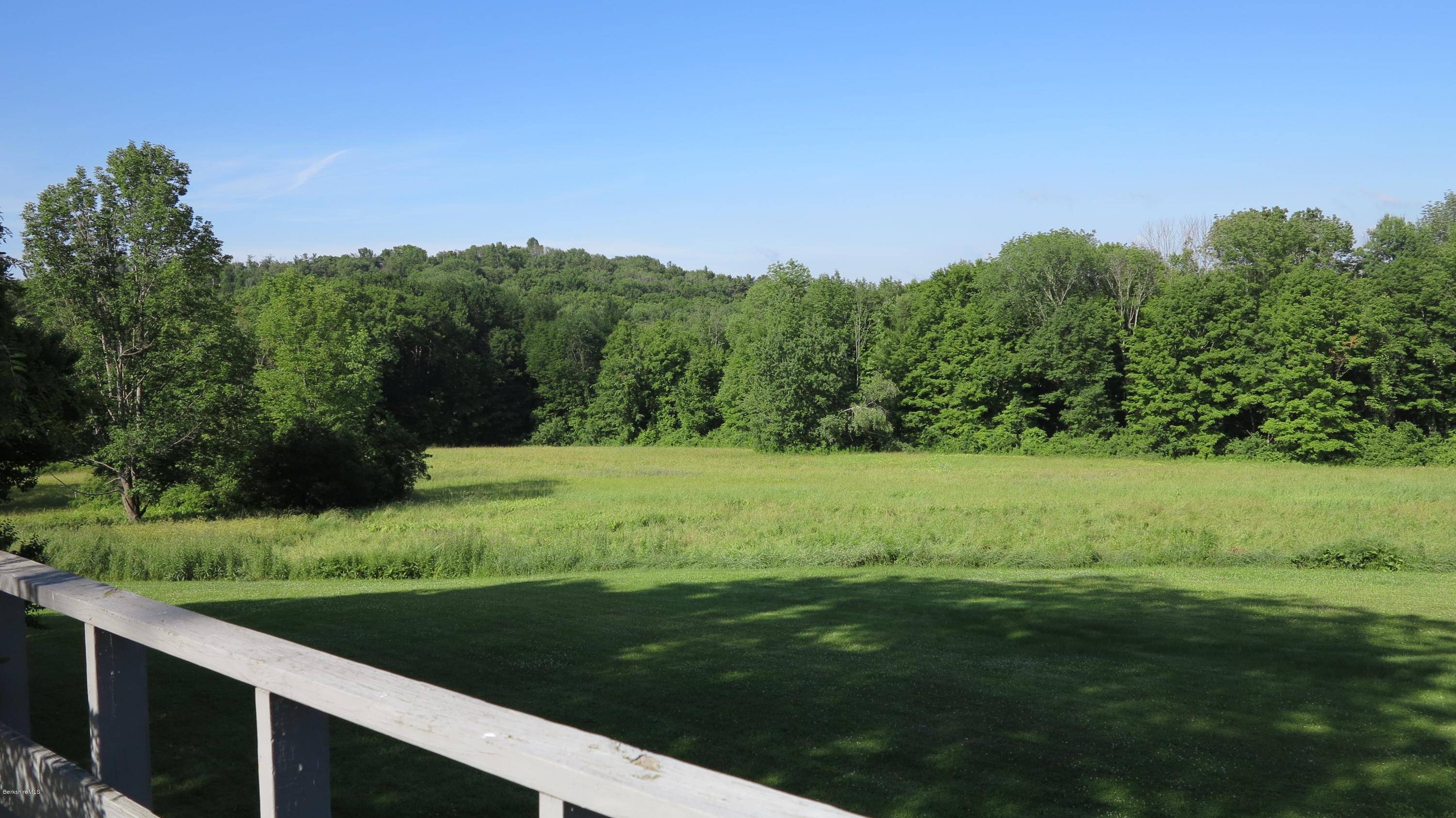 160 Cheever Road Richmond, MA 01254 - Photo 20 of 27 a view of a grassy area with an trees