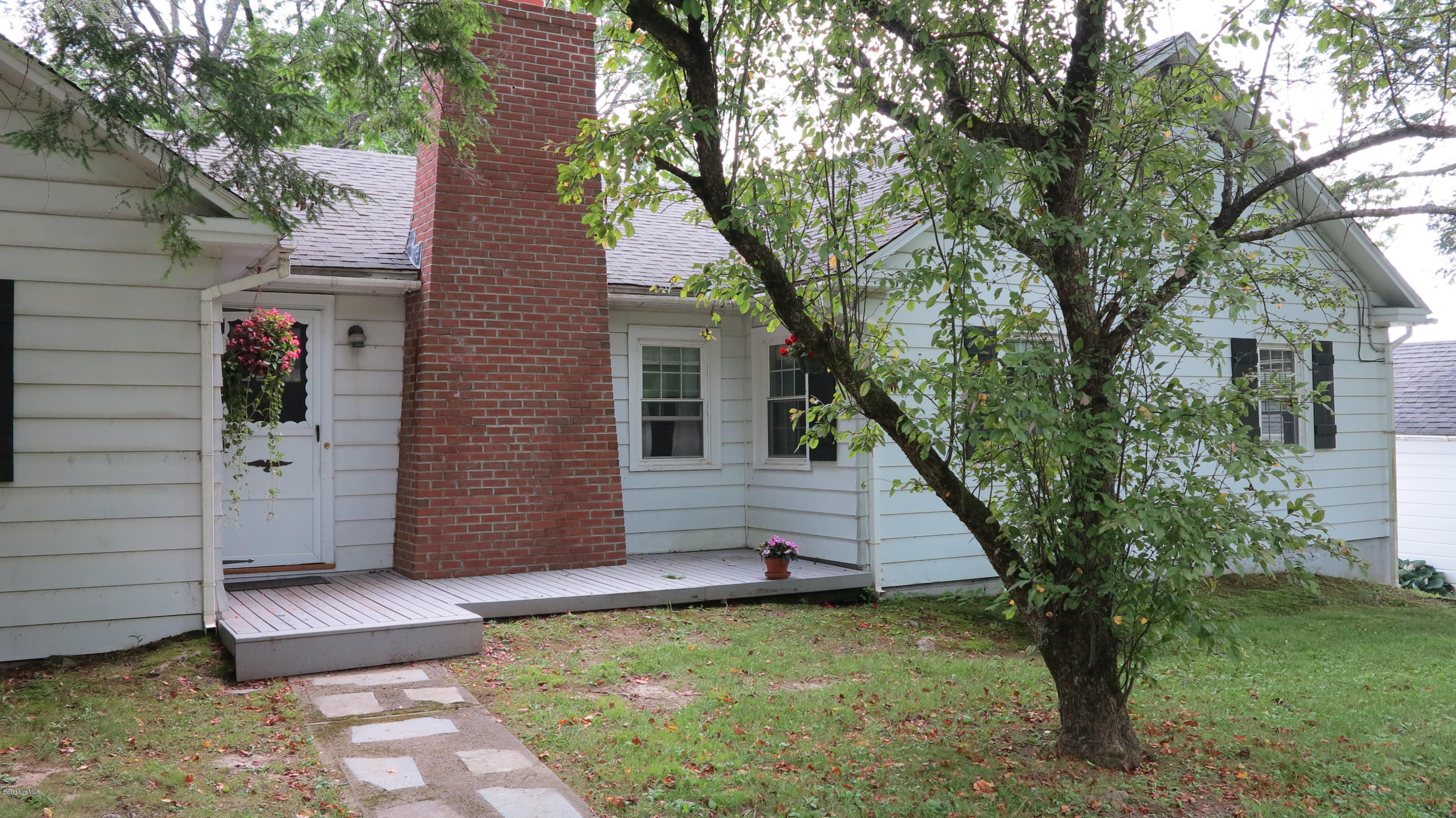 160 Cheever Road Richmond, MA 01254 - Photo 24 of 27 a view of a backyard with a large tree