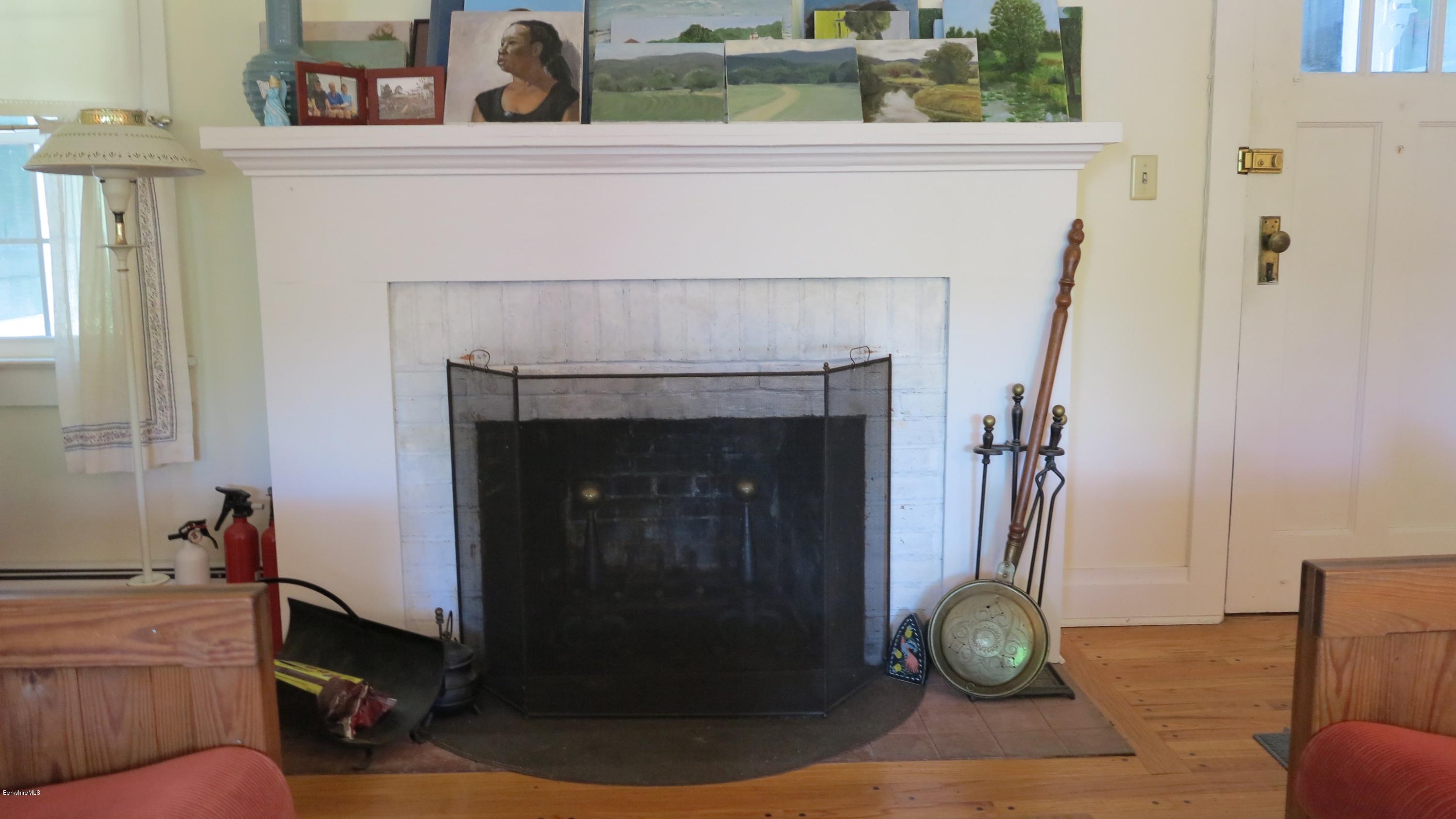 160 Cheever Road Richmond, MA 01254 - Photo 5 of 27 a close view of a fireplace in kitchen