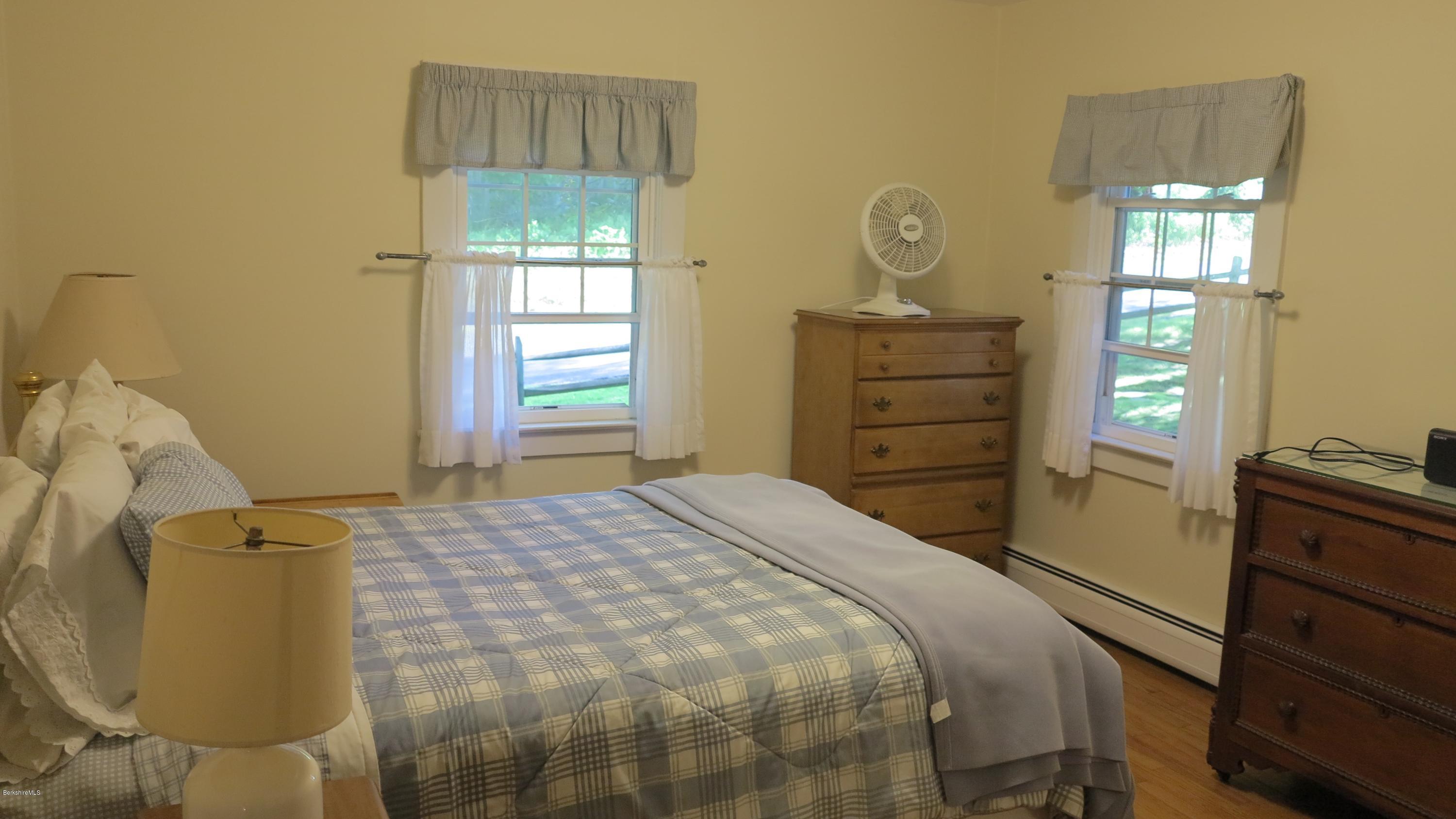 160 Cheever Road Richmond, MA 01254 - Photo 6 of 27 a bedroom with a bed and a dresser