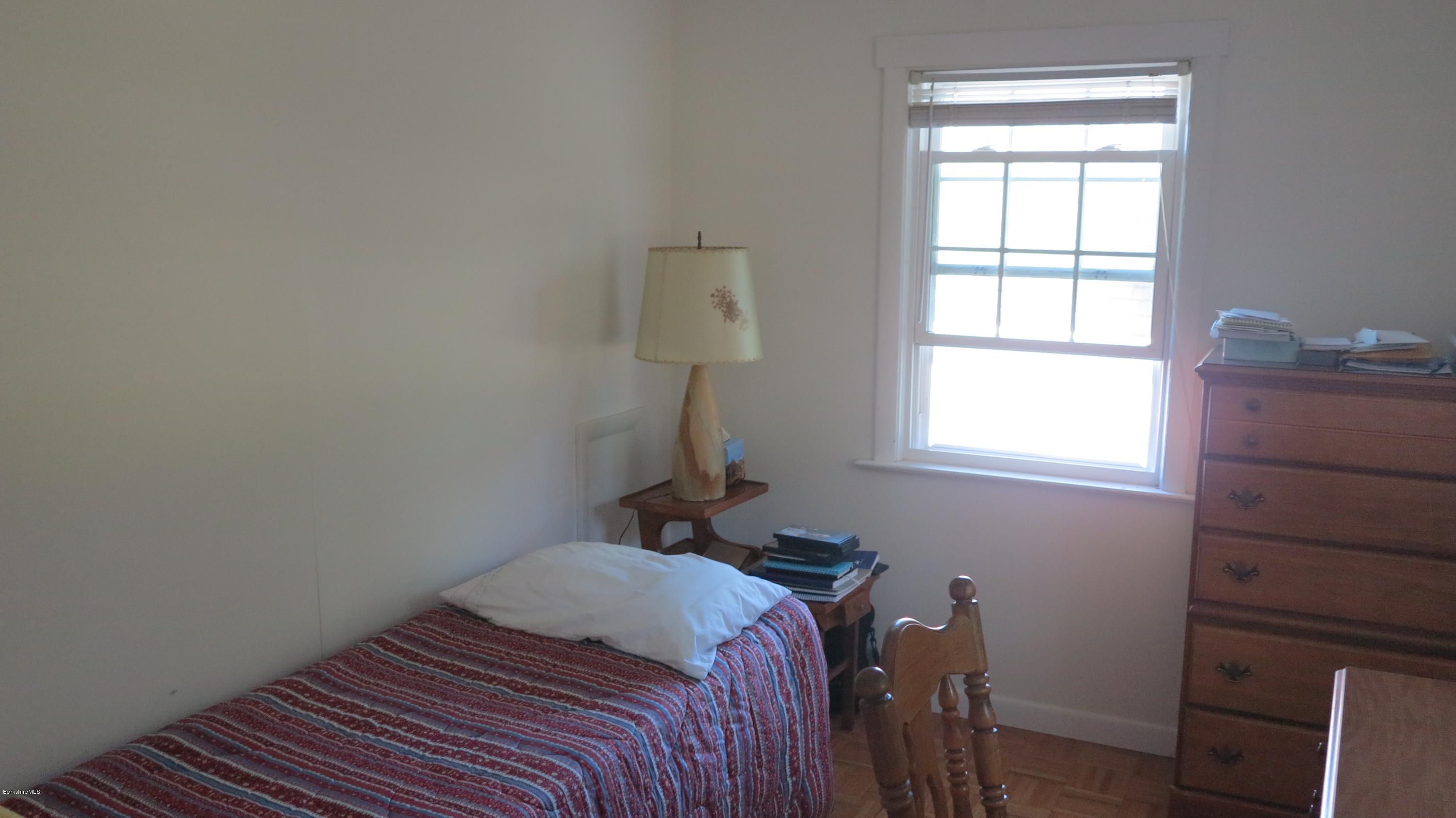 160 Cheever Road Richmond, MA 01254 - Photo 7 of 27 a bedroom with a bed and a window
