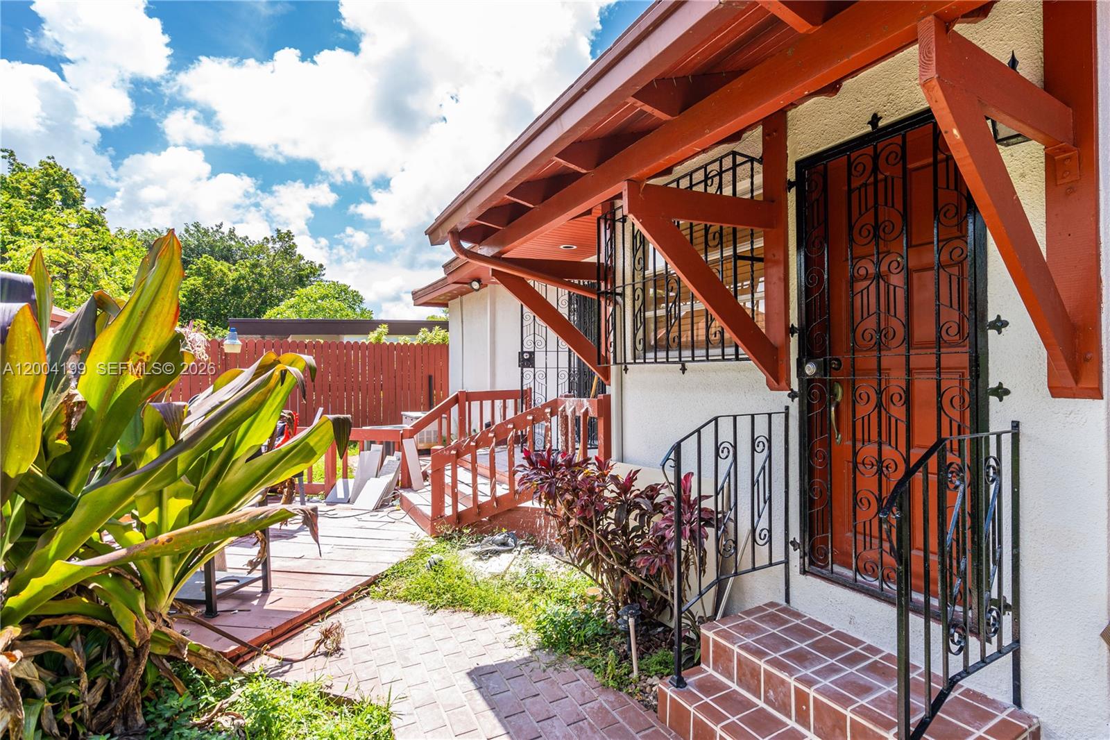 1841 Southwest 29th Avenue, Unit B Miami, FL 33145 - Photo 1 of 24 a view of a house with a yard