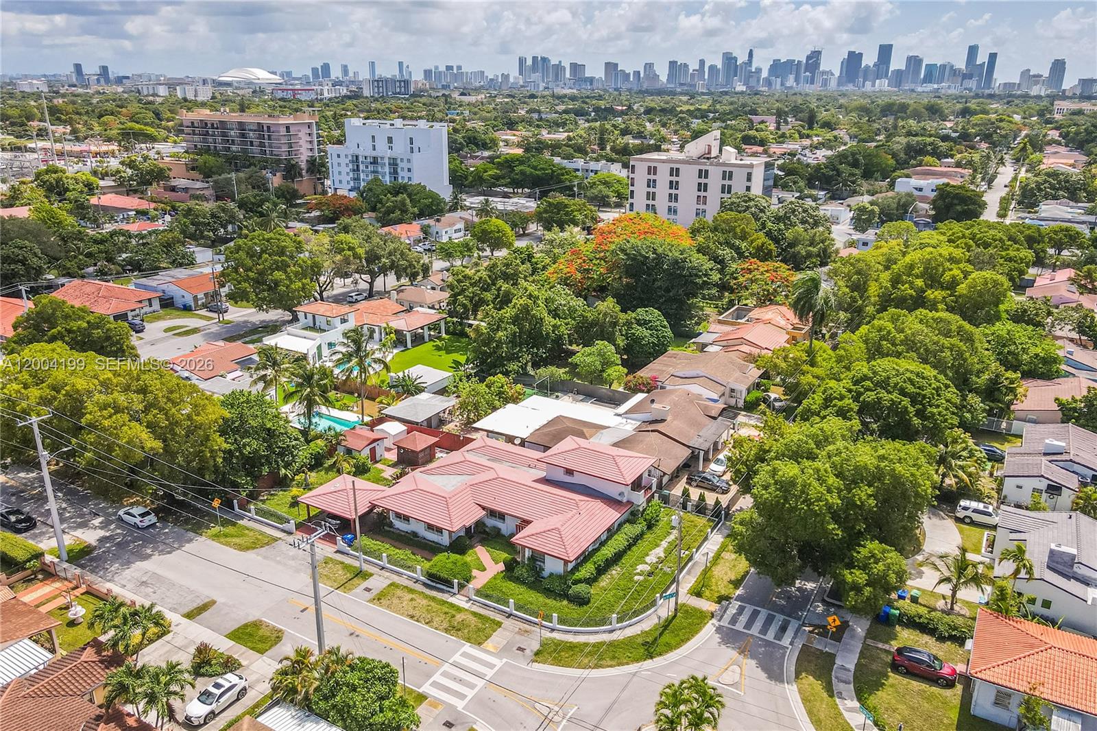 1841 Southwest 29th Avenue, Unit B Miami, FL 33145 - Photo 22 of 24 an aerial view of residential houses with city view