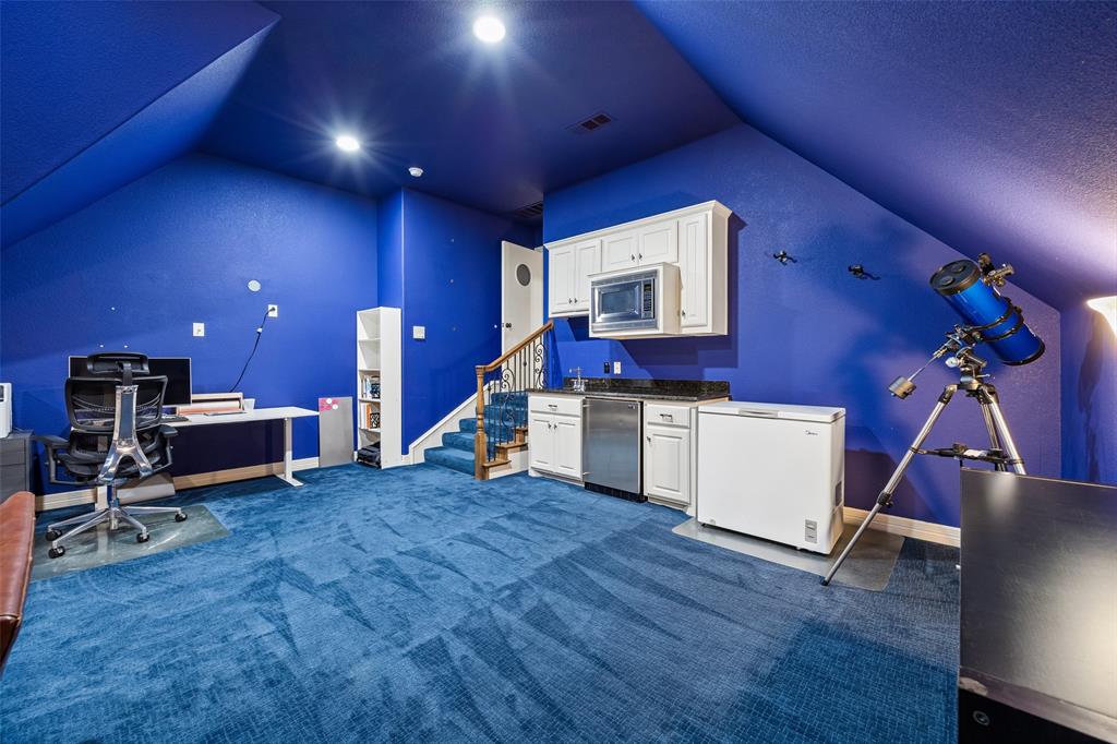 1608 Tuscan Ridge Circle Southlake, TX 76092 - Photo 26 of 36 a view of a room with gym equipment