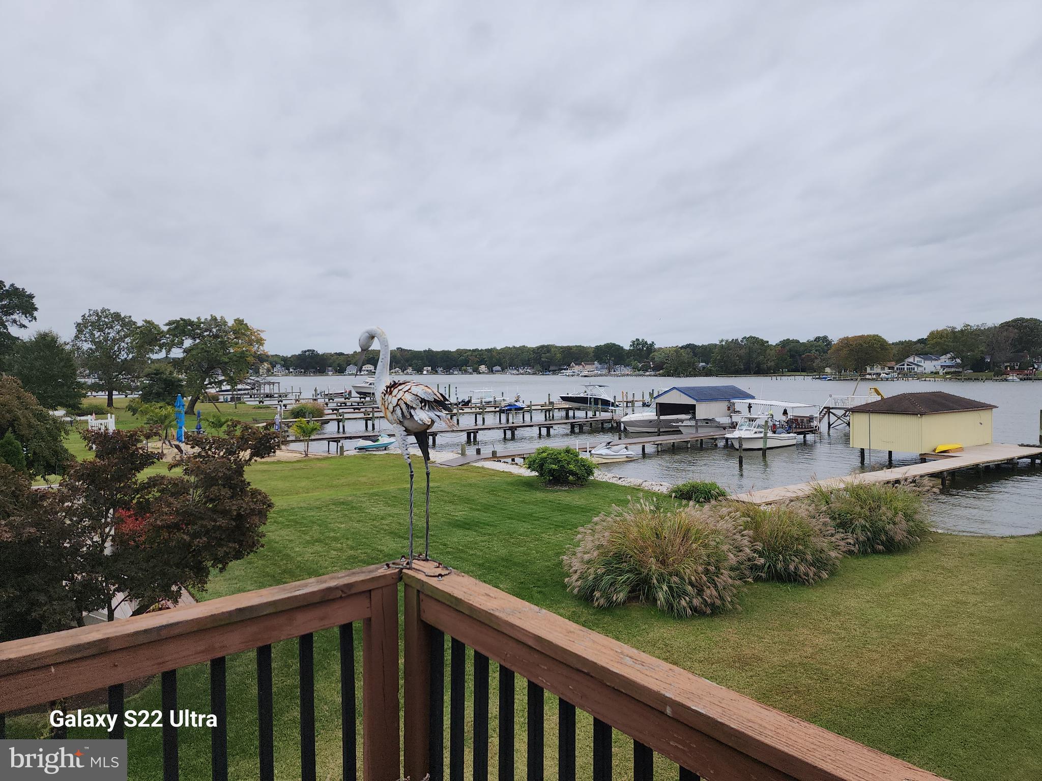 808 Seneca Park Road Baltimore, MD 21220 - Photo 14 of 15 a view of a lake with houses