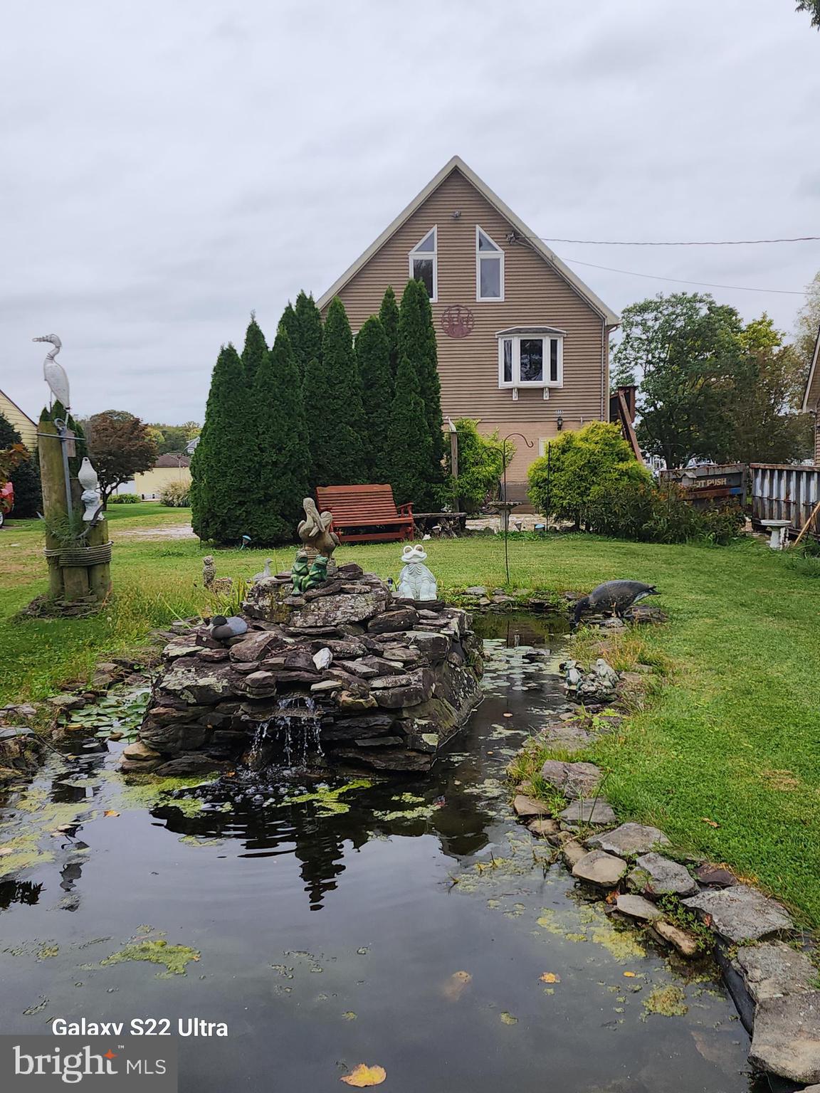 808 Seneca Park Road Baltimore, MD 21220 - Photo 4 of 15 a front view of a house with garden