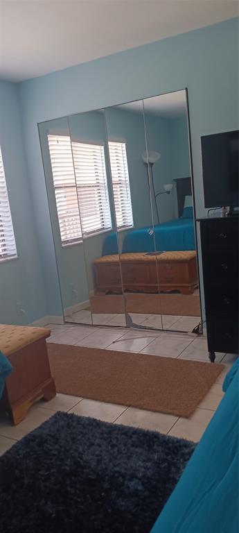 10145 Sunrise Lakes Boulevard, Unit 405 Sunrise, FL 33322 - Photo 16 of 48 a view of entryway with wooden floor